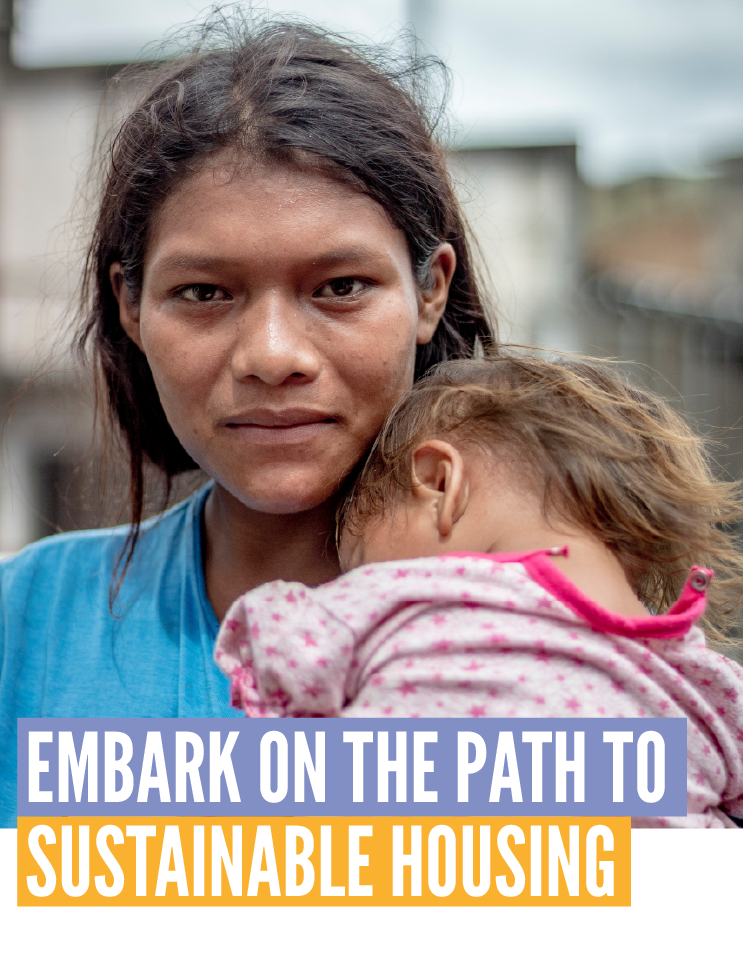 Woman holding baby with the header written above the image "Embark on the Path to Sustainable Housing"